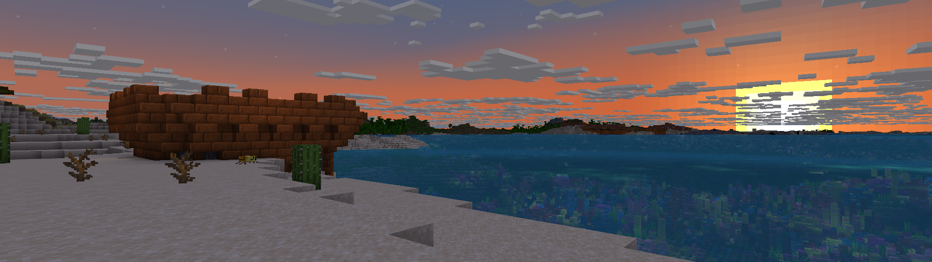 Minecraft sunset over ocean with Sandswept Ruin structure on a beach